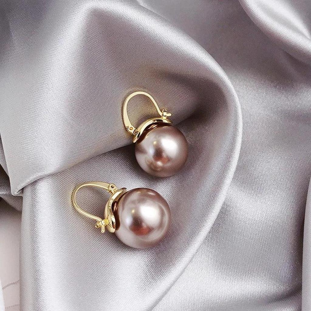 Fette Ohrringe mit Margeriten in Gold